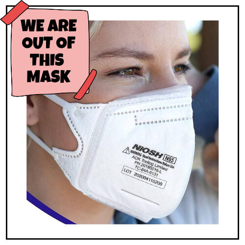 photo of white N95 duckbill respirator opened to full shape